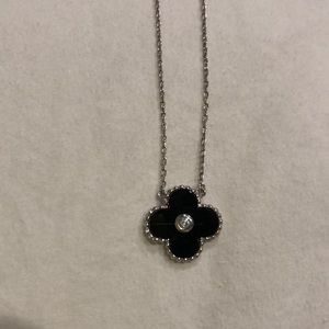 Super cute clover silver necklace with black and crystal detail
